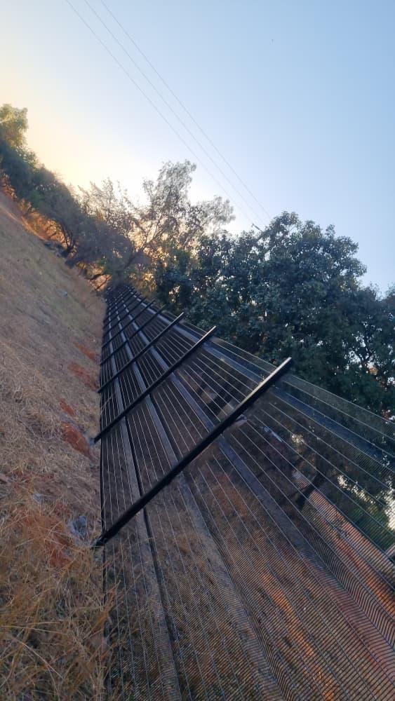 Black powder-coated boundary fence